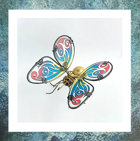 glazen-vlinder-mini-urn-keepsake-vleugel-goud-blauw-rood